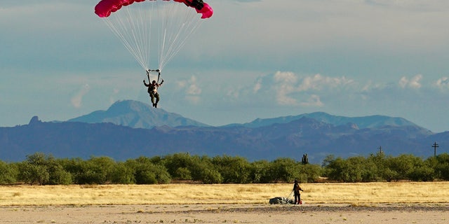 Former Navy SEAL Fred Williams parachutes in Arizona. Williams is one of 10 special operations veterans who will attempt to break a world record, skydiving into seven continents in seven days.