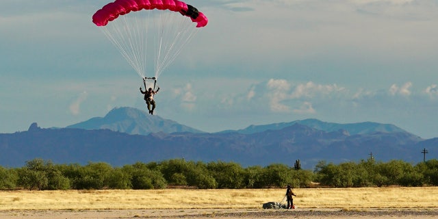 Former Navy SEAL Fred Williams parachutes in Arizona. Williams is one of 10 special operations veterans who will attempt to break a world record, skydiving into seven continents in seven days.