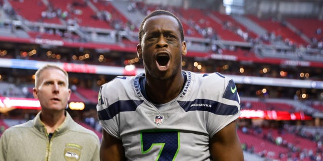 Geno Smith #7 of the Seattle Seahawks reacts after an NFL football game between the Arizona Cardinals and the Seattle Seahawks at State Farm Stadium on November 6, 2022 in Glendale, Arizona.