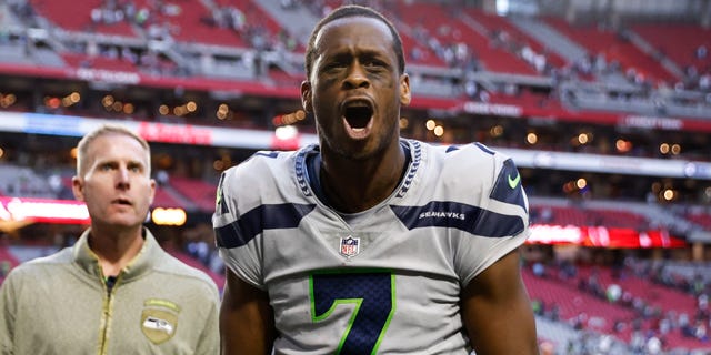 Geno Smith #7 of the Seattle Seahawks reacts after an NFL football game between the Arizona Cardinals and the Seattle Seahawks at State Farm Stadium on November 06, 2022 in Glendale, Arizona.
