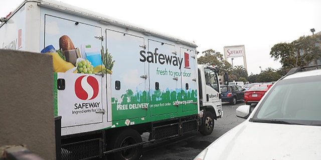 A Safeway.com delivery truck is seen outside a Safeway on Market Street on Wednesday, January 6, 2021, in San Francisco, Calif. 