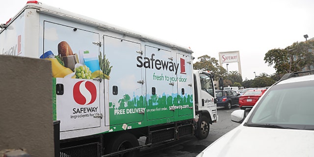 A Safeway.com delivery truck is seen outside a Safeway on Market Street on Wednesday, January 6, 2021, in San Francisco, Calif. 