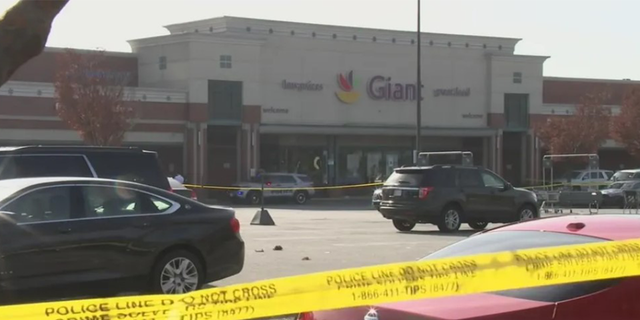 An alleged shoplifter and a grocery store security guard died Friday after the two exchanged gunfire at the store in Maryland.