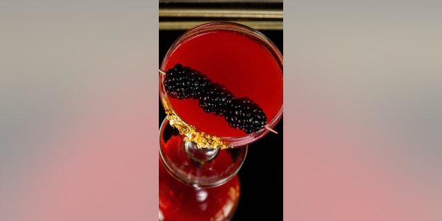 Created by mixologist Alexanderia Poole of Richmond, Virginia, this cocktail uses blackberries and pineapple for a fruity twist. 