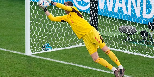 Belgium's goalkeeper Thibaut Courtois blocks a shot during the World Cup Group F soccer match between Belgium and Canada at Ahmad Bin Ali Stadium in Doha, Qatar, Wednesday, Nov. 23, 2022.