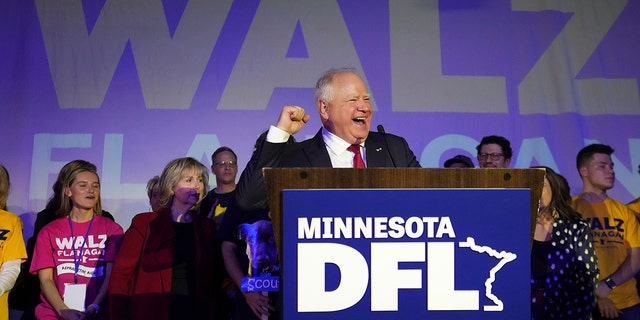 Minnesota Gov. Tim Walz speaks to the crowd at the DFL election-night party after winning re-election against Republican challenger Scott Jensen, Tuesday, Nov. 8, 2022, in St. Paul, Minn.