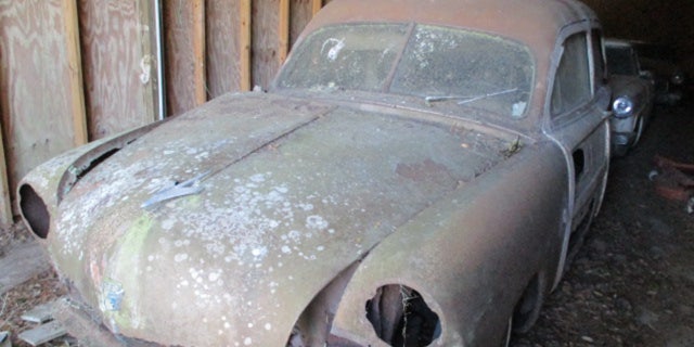 Gonzalez's 1951 Ford Woody Wagon is missing some of its paneling. 