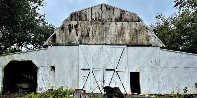 Gonzalez stored several cars in this barn on a farm he owned.