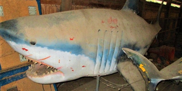 Leroy Gonzalez used these 14-foot fiberglass sharks to promote World of Wheels.