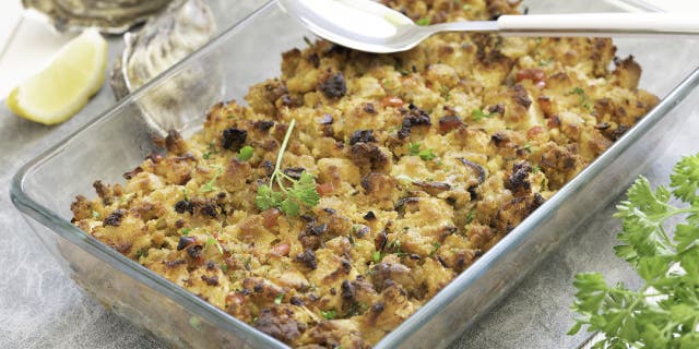 Oyster stuffing is a popular holiday stuffing in some parts of the U.S. Here's a homemade oyster cornbread stuffing made with red bell peppers, celery, onion, herbs, crumbled cornbread, cubed white bread and oyster pieces.