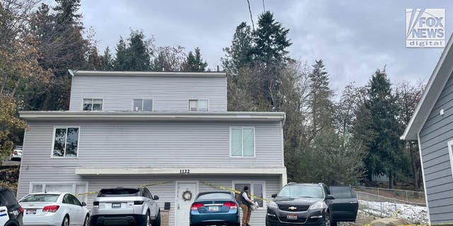 Investigators leaving the house in Moscow, Idaho Tuesday, November 22, 2022, where four people were slain on November 13.