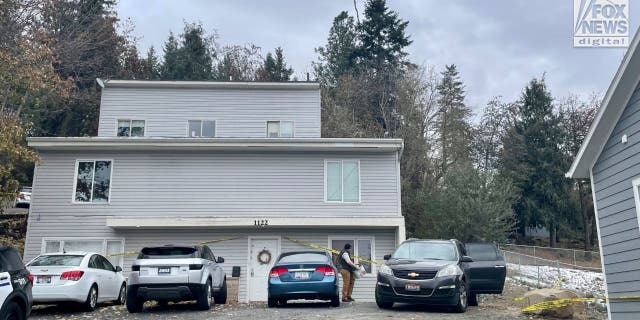 Investigators leaving the house in Moscow, Idaho Tuesday, November 22, 2022, where four people were slain on November 13.