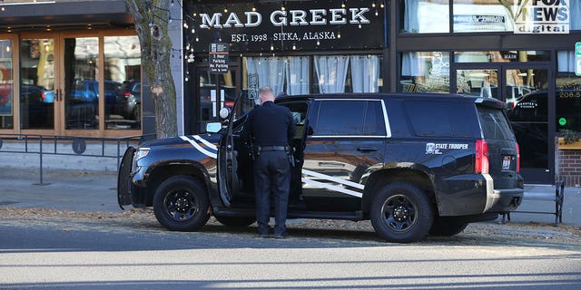 Idaho State Patrol is seen outside Mad Greek restaurant in Moscow, Idaho, Thursday, November 17, 2022. 