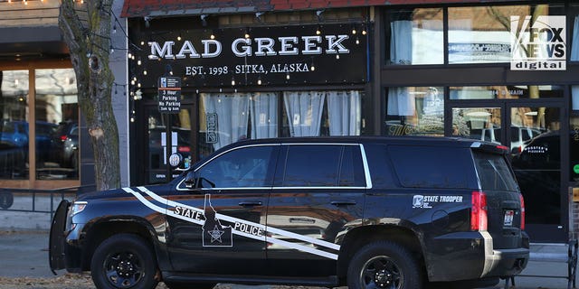 Idaho State Patrol is seen outside the Mad Greek restaurant in Moscow, Idaho, Thursday, November 17, 2022. The eatery is set to reopen today after being closed this week following the murder of two of its servers, Madison Mogen, and Xana Kernodle at the weekend.