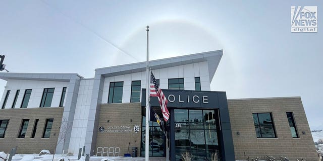 A flag outside the Moscow police department in Idaho is lowered to half-staff on Tuesday, November 29, 2022. An investigation continues into the quadruple homicide in an off-campus house in Moscow on November 13.