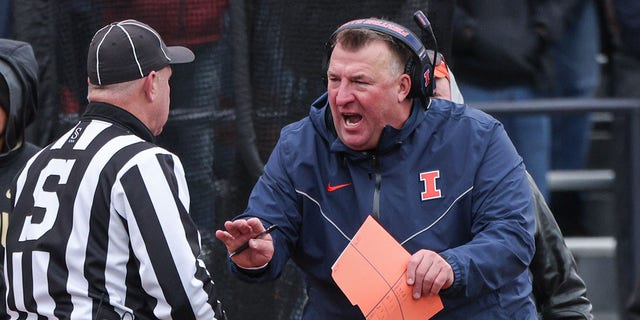 Illinois Fighting Illini Head Coach Brett Bielema protests a call during a game against the Purdue Boilermakers at Memorial Stadium on November 12, 2022 in Champaign, Ill. 