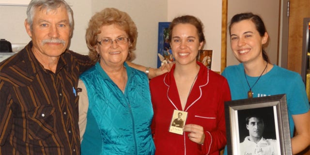 Michelle Duppong (in red), pictured with parents Ken and Mary Ann and sister Renae, had a zeal to spread the gospel, Archbishop Listecki said.