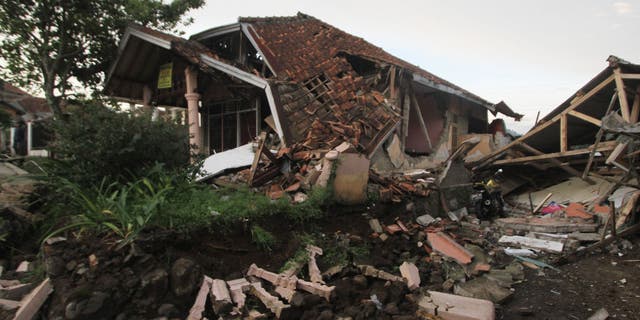 Several buildings collapsed due to an earthquake in the area of ​​Nyalindung Village, Cuguenang Subdistrict, Cianjur, West Java, Indonesia on Monday, November 21, 2022. The magnitude 5.6 earthquake killed 162 people and hundreds injured.  (Photo by Eko Siswono Toyudho/Anadolu Agency via Getty Images)