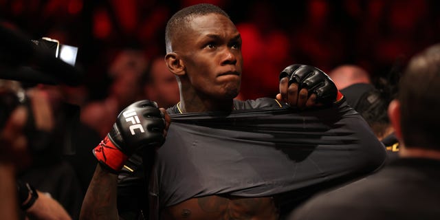 Israel Adesanya prepares to enter the octagon ahead of his middleweight bout against Alex Pereira at UFC 281 at Madison Square Garden on November 12, 2022 in New York City.
