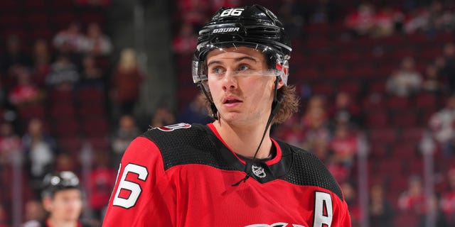 Jack Hughes #86 of the New Jersey Devils looks on prior to the game against the Toronto Maple Leafs at the Prudential Center on November 23, 2022 in Newark, New Jersey.