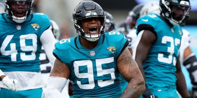 Jaguars blank Raiders in second half, come back to win at home 3 Roy Robertson-Harris (95) of the Jacksonville Jaguars celebrates after making a tackle in the first quarter against the Las Vegas Raiders at TIAA Bank Field on Nov. 6, 2022, in Jacksonville, Florida.