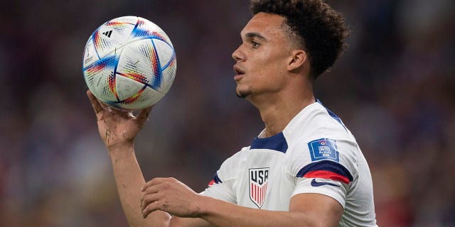 Antonee Robinson of USA prepares to take a throw in during the FIFA World Cup Qatar 2022 Group B match between USA and Wales at Ahmad Bin Ali Stadium on November 21, 2022, in Doha, Qatar. 