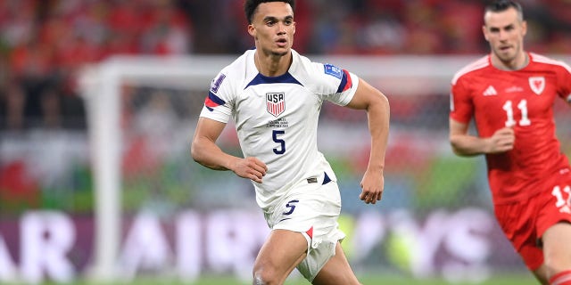 USA player Antonee Robinson in action during the FIFA World Cup Qatar 2022 Group B match between USA and Wales at Ahmad Bin Ali Stadium on November 21, 2022 in Doha, Qatar.