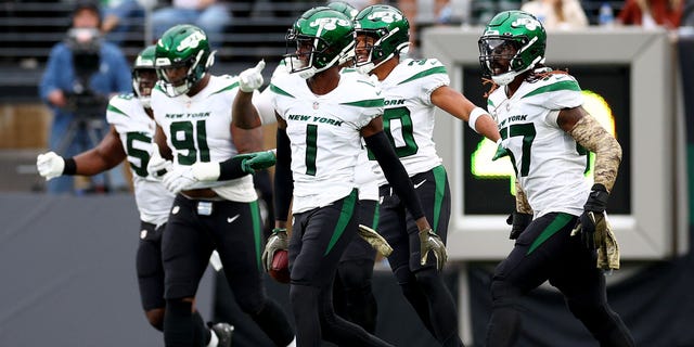 Sauce Gardner (1) of the New York Jets celebrates after an interception against the Buffalo Bills during the first quarter at MetLife Stadium on Nov. 6, 2022, in East Rutherford, New Jersey.