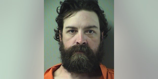 Jonathan Davis, 37, was arrested after allegedly stabbing a hiker who had befriended him while on the Florida Natural Scenic Trail in Crestview.