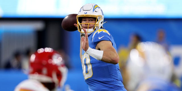 Justin Herbert of the Los Angeles Chargers throws against the Kansas City Chiefs at SoFi Stadium on Nov. 20, 2022, in Inglewood, California.