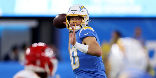 Justin Herbert of the Los Angeles Chargers throws against the Kansas City Chiefs at SoFi Stadium on Nov. 20, 2022, in Inglewood, California.