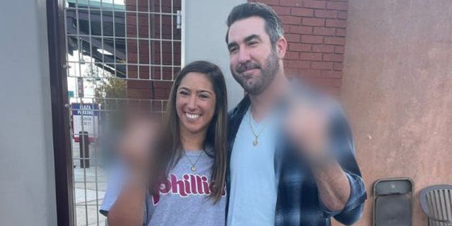 Houston Astros pitcher Justin Verlander and Phillies fan Stephanie Di Ianni flip the bird during interaction before Game 3 of the World Series in Philadelphia, Pa. 