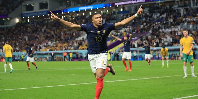 Kylian Mbappé of France celebrates scoring the third goal during the FIFA World Cup Qatar 2022 Group D match between France and Australia at Al Janoub Stadium Nov. 22, 2022, in Al Wakrah, Qatar.