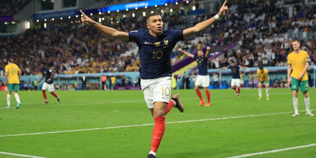 Kylian Mbappe of France celebrates scoring the 3rd goal during the FIFA World Cup Qatar 2022 Group D match between France and Australia at Al Janoub Stadium on November 22, 2022 in Al Wakrah, Qatar.