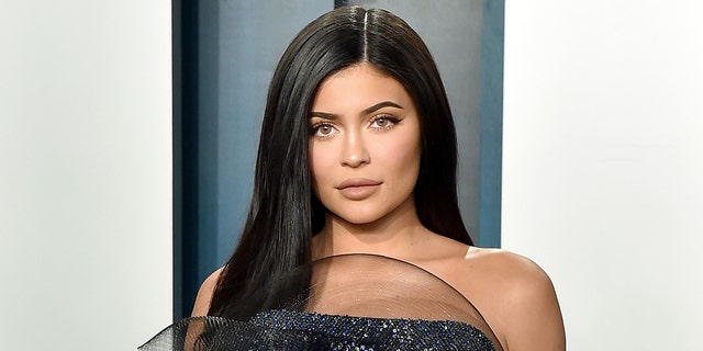 Kylie Jenner responded to fans who accused her of thwarting Balenciaga scandal by posting pictures of her family.