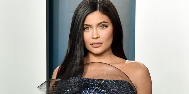 Kylie Jenner responded to fans who accused her of thwarting Balenciaga scandal by posting pictures of her family.