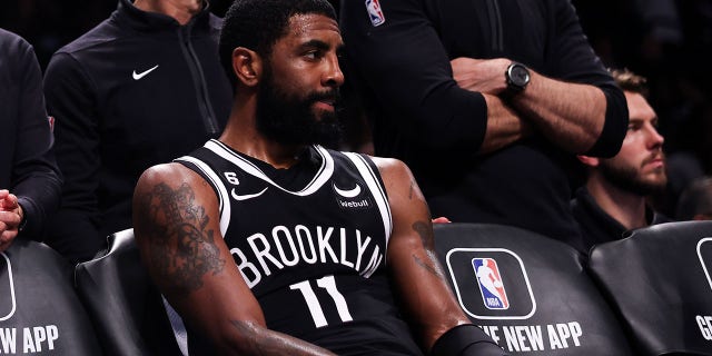 Kyrie Irving, #11 of the Brooklyn Nets, sits on the bench during a timeout in the fourth quarter of the game against Chicago Bulls at Barclays Center on Nov. 1, 2022 in New York City.