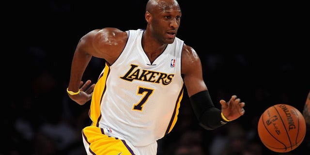 Lamar Odom #7 of the Los Angeles Lakers drives the ball up during the game against the Denver Nuggets at Staples Center on April 3, 2011 in Los Angeles, California.