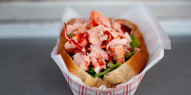 FILE - A lobster roll at Harraseeket Lunch and Lobster in South Freeport, Maine.