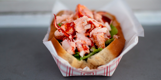 FILE - A lobster roll at Harraseeket Lunch and Lobster in South Freeport, Maine.