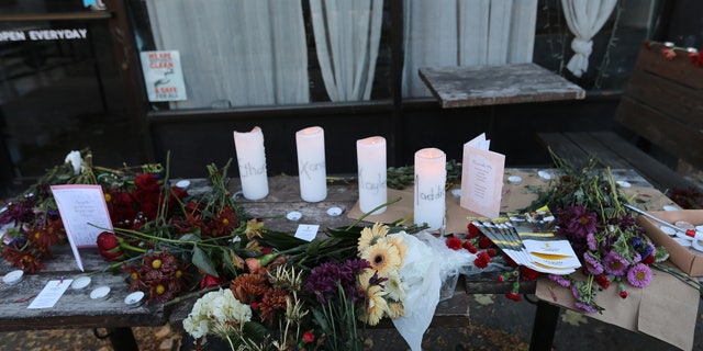 A small memorial is seen at the Mad Greek restaurant in Moscow, Idaho, on Tuesday, November 15, 2022. Murder victims Madison Mogen and Xana Kernodle worked here as servers for a couple of years. 