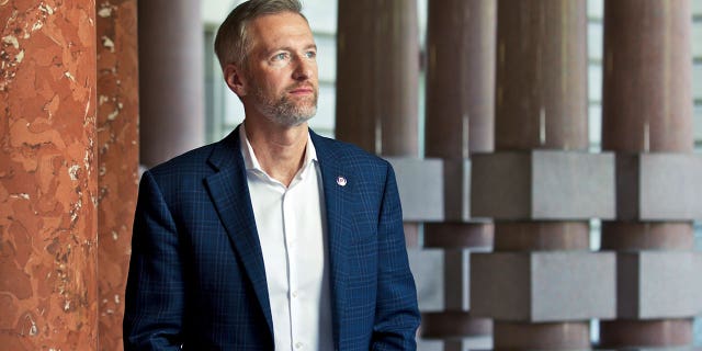 Portland Mayor Ted Wheeler poses for a photo outside City Hall of Oregon on Aug. 5, 2019.