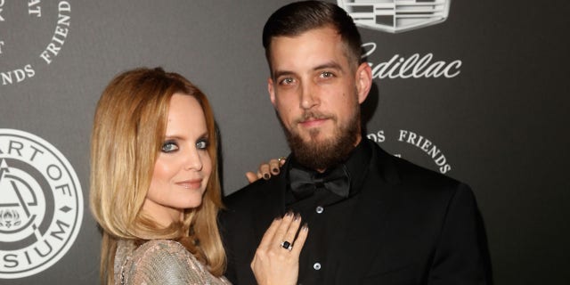 Mena Suvari and husband Michael Hope married in 2018 and had their first child in 2021.