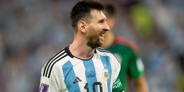 Lionel Messi #10 of Argentina smiles during a FIFA World Cup Qatar 2022 Group C match between Mexico and Argentina at Lusail Stadium on November 26, 2022 in Lusail, Qatar.