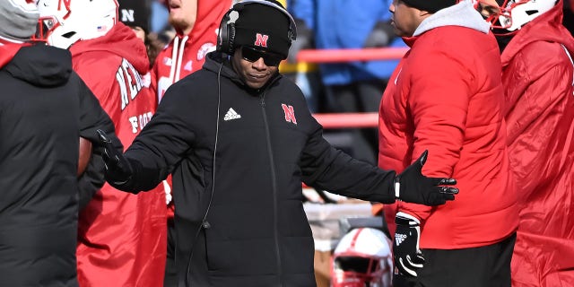 Interim head coach Mickey Joseph of the Nebraska Cornhuskers walks the sidelines against the Wisconsin Badgers during the second half at Memorial Stadium on November 19, 2022, in Lincoln, Nebraska. 