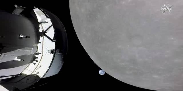 NASA's Orion space capsule snapped a picture of Earth after returning from the dark side of the moon on Monday.
