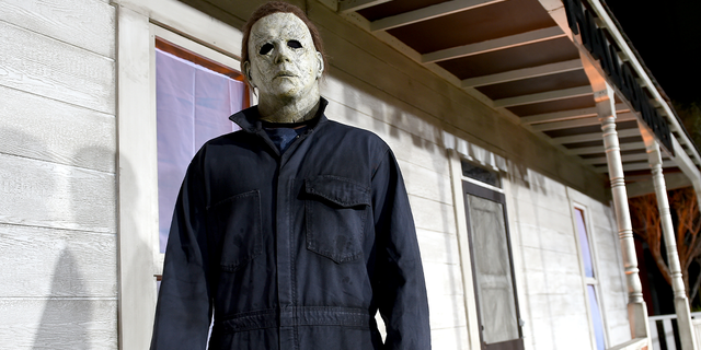 An actor dressed as the character of Michael Myers attends the Universal Pictures' "Halloween" premiere at TCL Chinese Theatre on October 17, 2018 in Hollywood, California. (Photo by Kevin Winter/Getty Images)