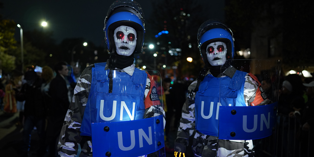 Revelers wearing different costumes attend the Halloween Parade in Lower Manhattan of New York City Oct. 31, 2022. New York City's biggest and most renowned Halloween parade returns to Greenwich Village Monday night for the 49th time.