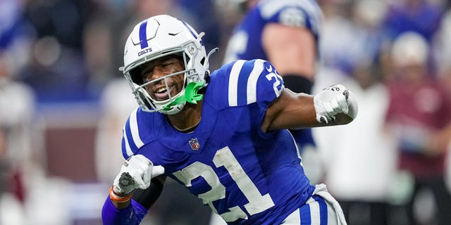 Nyheim Hines #21 of the Indianapolis Colts celebrates after scoring a touchdown in the fourth quarter against the Washington Commanders at Lucas Oil Stadium on October 30, 2022 in Indianapolis, Indiana.