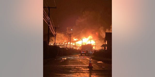Old Mystic fire seen billowing from the seaport.